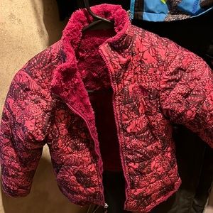 Reversible North Face jacket. One side furry.